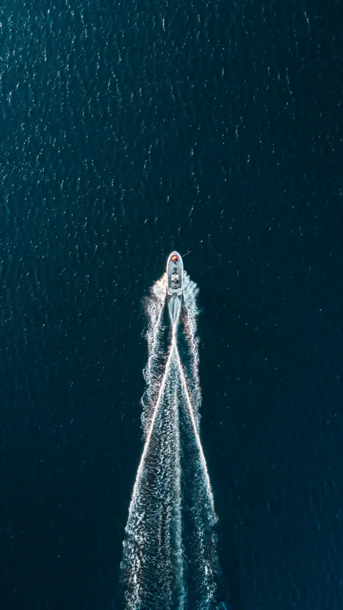 aerial photography of motorboat on sea