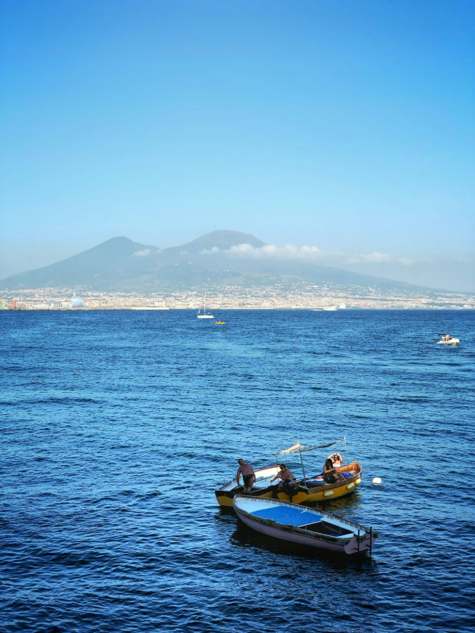 two yellow and white boats